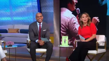 Elie Tahari Puff Sleeve Sweater in Summer Coral worn by Eva Pilgrim as seen in Good Morning America on September 19, 2023