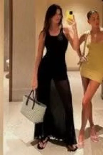 Khaite Nivea Pleated Maxi Dress worn by  Kendall Jenner on her Instagram Story on August 25, 2023