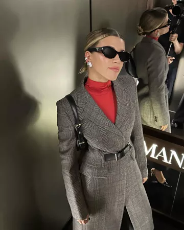 Prada Single Breasted Prince of Wales Mouline Coat worn by Sofia Richie at Prada Show on September 21, 2023
