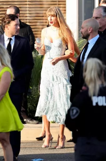 Gucci Mallory Crystal Embellished Suede Sandals worn by Taylor Swift at Margaret Qualley & Jack Antonoff’s Wedding Post on August 19, 2023