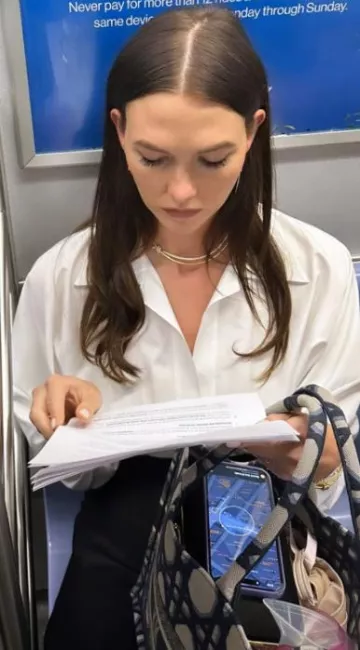 Dior Medium Dior Book Tote worn by Karlie Kloss on her Instagram Story on September 22, 2023