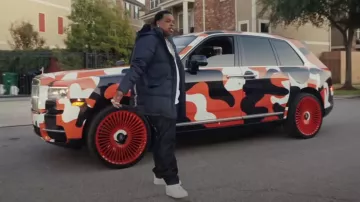 Evisu Deep Blue Dragon Logo Down Coat worn by Finesse2tymes in Warfare [Official Music Video]