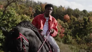 Louis Vuitton Orange Allover Graffiti Logo Jacket porté par YoungBoy Never Broke Again in Testimony [Official Video Music]