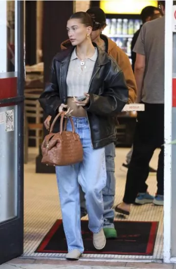 Heavy Manners Sand Something Special Knit Polo worn by  Hailey Bieber  in La on  September 19, 2023