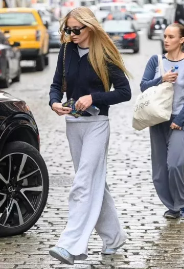 Nike Air Jordan 1 Low University Blue Grey Sneakers worn by Sophia Turner in New York City on September 28, 2023