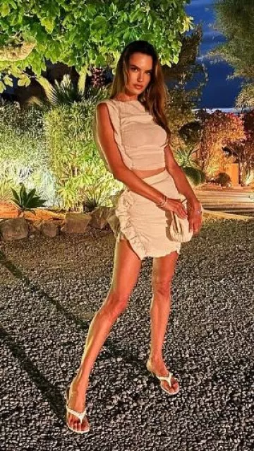 Fendi First Interlace Clutch worn by Alessandra Ambrosio on  her Instagram  on August 7, 2023