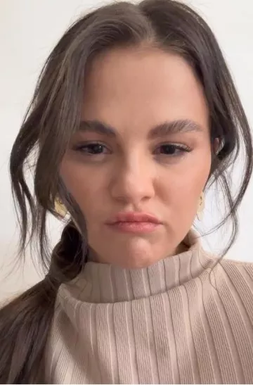 Giorgio Armani Ribbed-Wool Mock-Neck Jumper worn by Selena Gomez on her Instagram Story on August 2, 2023