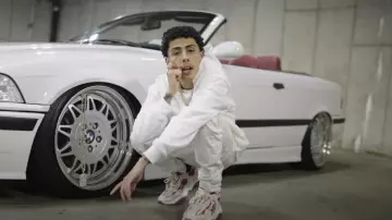 Amiri Red & White Bone Runner Sneakers worn by J.I. in Please Don't Go (Official Music Video)