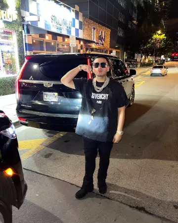 Givenchy Black Destroyed Givenchy Paris T Shirt worn by Jesus Ortiz Paz on his Instagram account @jesusortizpazfr