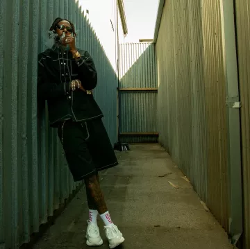 Prada White Sculpted Systeme Sneakers portés par 2 Chainz sur son compte Instagram @2chainz