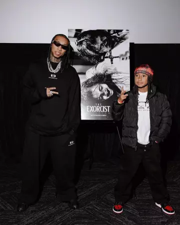 Givenchy Black 4G Hinge Cat Eye Sunglasses worn by Tyga on his Instagram account @tyga