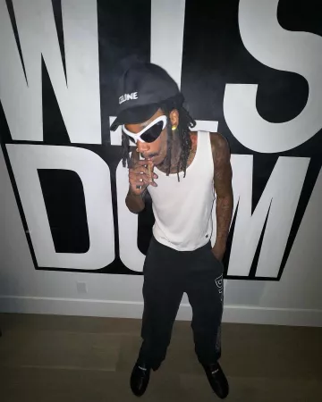 Celine Black Logo Adjustable Hat worn by Wiz Khalifa on his Instagram account @wizkhalifa