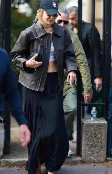 Mango Oversized Worn-Effect Leather Jacket worn by Gigi Hadid in Paris on October 3, 2023