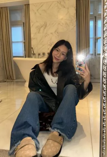 Louis Vuitton Topstitched Leather Boxy Biker Jacket worn by Taeyeon on her Instagram Post on October 3, 2023