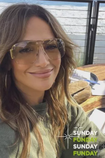 Bottega Veneta Gold Tone Gradient Effect Aviator Shades worn by Jennifer Lopez on her Instagram Story on October 8, 2023
