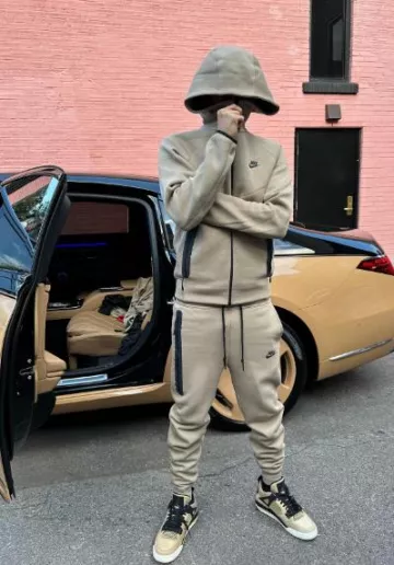 Nike Beige Windrunner Zip Hoodie worn by Central Cee on his Instagram account @centralcee