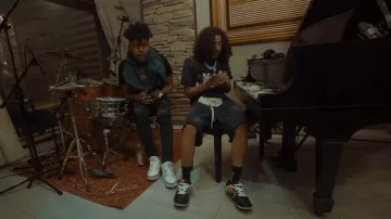 Amiri Black Varsity Tiger Sweatshorts porté par DD Osama dans Name A Time with Hopout Shawn (Vidéo officielle)