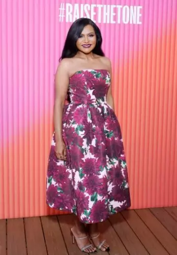 Oscar de la Renta Strapless Floral-Print Faille Midi Dress worn by Mindy Kaling at Lion Pose Launch post on August 1, 2023