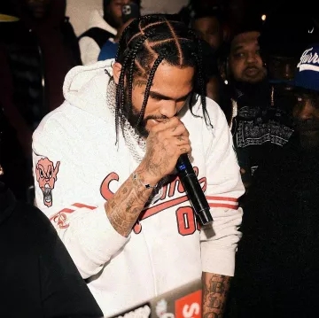 Supreme x Mitchell & Ness White Devil Baseball Jersey worn by Dave East on the Instagram account @daveeast