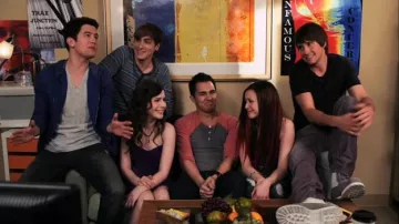 Urban Outfitters Alternative 3/4 Two-Tone Henley Tee worn by Carlos Garcia (Carlos PenaVega) in Big Time Rush (S02E23)