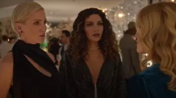 Gira el mono número 46 usado por Dinah Drake (Juliana Harkavy) como se ve en Arrow (T08E09)
