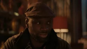 Gorra Stetson Tweed Flapc usada por Assane (Omar Sy) como se ve en Lupin (S03E01)