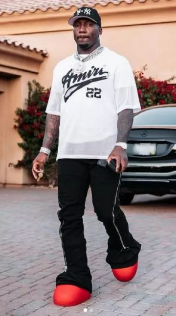 T-shirt 'Amiri White Mesh 'Amiri 22' porté par Deebo Samuel sur le compte Instagram @19problemz