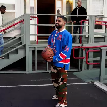 Saint Michael Blue & Red Hock­ey Jer­sey worn by Nav on the Instagram account @nav
