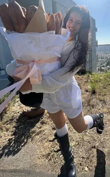 Botas Moto Altas Miu Miu Multi Buckle usadas por Rosalía en su Instagram el 17 de octubre de 2023