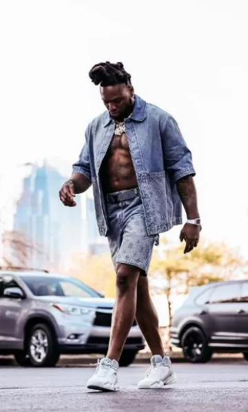 Louis Vuitton Silver Leather & Black LV Initiales Belt worn by Derrick Henry on the Instagram account @titans