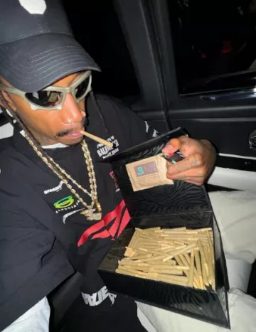 Balenciaga Matte Grey Bat Rectangle Sunglasses worn by Wiz Khalifa on the Instagram account @wizkhalifa