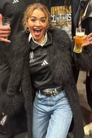Alberta Ferretti Belted Mongolian Fur Wool Blend Coat worn by Rita Ora on her Instagram post on October 28, 2023