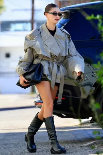MM6 Maison Margiela Black Knee High Boots worn by Hailey Baldwin in Los Angeles on October 28, 2023