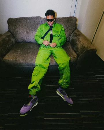 Bottega Veneta Olive Green Nylon Zip Jacket worn by Myke Towers on the Instagram account @myketowers