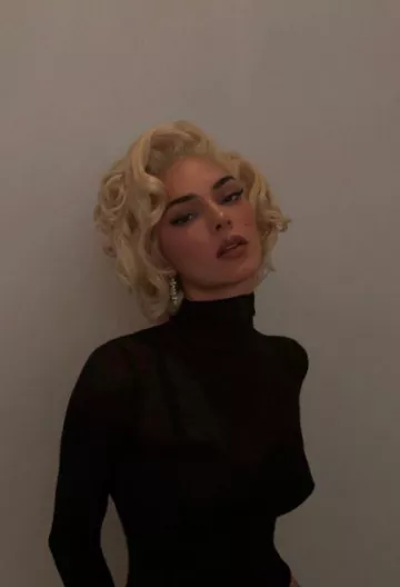 Intimissimi Modal Cashmere Ultralight High Neck Top worn by Kendall Jenner on her Instagram post on October 29, 2023