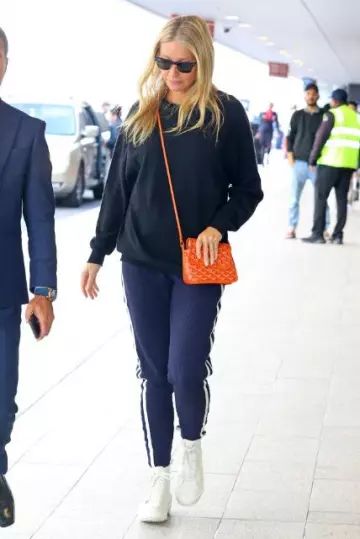 Ray Ban Rb3016 Clubmaster Sunglasses worn by Gwyneth Paltrow at Sydney Airport on October 28, 2023