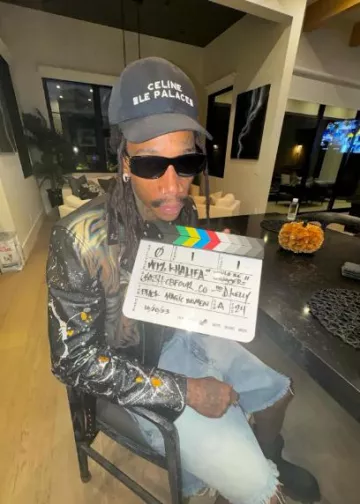 Celine Black Triomphe 07 Sunglasses worn by Wiz Khalifa on the Instagram account @wizkhalifa