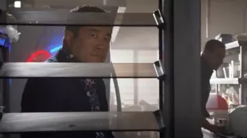 Jared Lang Flo­ral Print Shirt worn by Detective Gordon Katsumoto (Tim Kang) as seen in Magnum P.I. (S05E15)