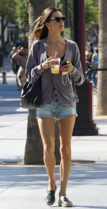 Chanel Black Slip On Espadrilles worn by Alessandra Ambrosio in Santa Monica on October 13, 2023