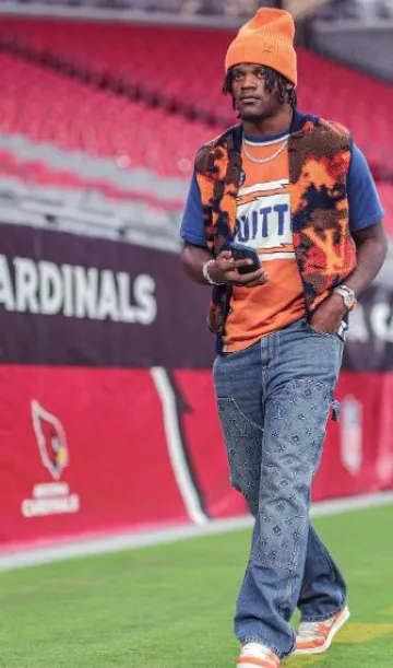 Bonnet Louis Vuitton Orange LV Ahead porté par Lamar Jackson sur le compte Instagram @new_era8