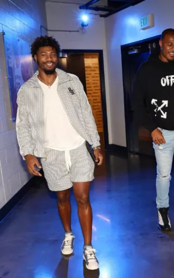 Puma x Rhuigi White & Blue Pinstriped Jacket worn by Marcus Smart on the Instagram account @youngamechanger