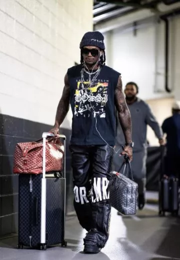 Goyard Grey Ambassade Bag worn by CeeDee Lamb on the Instagram account @cee2x___