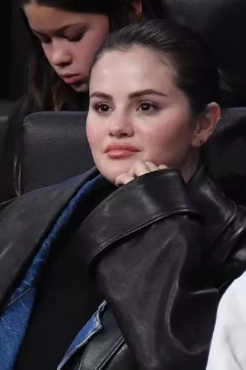 Alexander Wang Shawl Leather Coat worn by Selena Gomez at Lakers Game on October 30, 2023