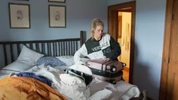 Versace Jeans Pullover Crewneck Sweatshirt worn by Olivia Flowers as seen in Southern Charm (S09E09)