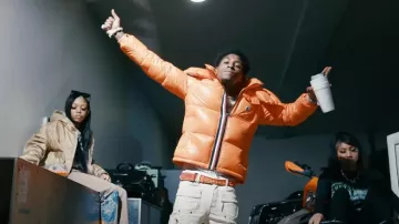 Christian Louboutin Or­ange Spiked Loubi Belt worn by YoungBoy Never Broke Again in GUAPI (Official Music Video)