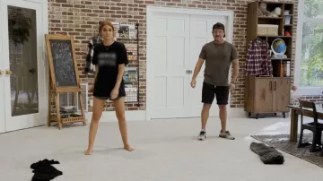 Armor Coffee Ar­mor Black Block Text T-shirt worn by Jenn Todryk as seen in No Demo Reno (S03E09)