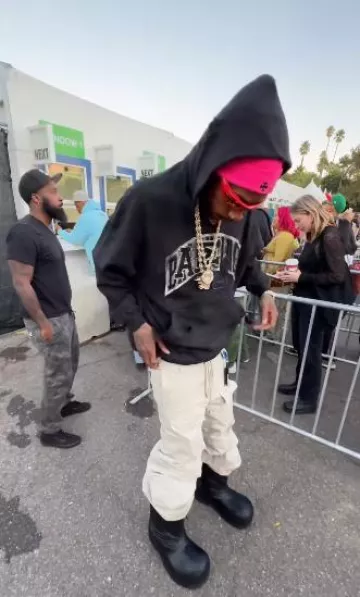 Balenciaga Khaki Flared Zip Off Cargo Pants worn by Wiz Khalifa on the Instagram account @wizkhalifa