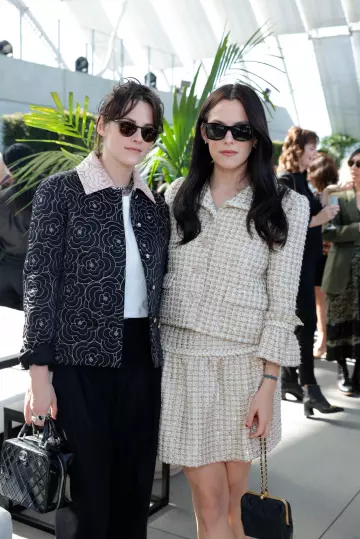 Chanel Black Floral Quilted Jacket worn by Kristen Stewart at Academy Women's Luncheon Presented By Chanel at the Academy Museum of Motion Pictures on November 9, 2023 in Los Angeles, California.