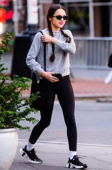 Khaite Oliver Peoples 1969C Oval Sunglasses worn by  Olivia Rodrigo in New York City on November 12, 2023