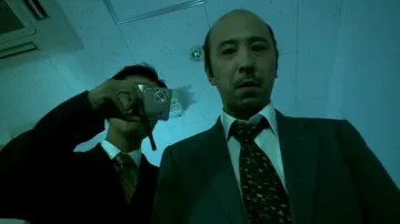 Digital camera used by Police Inspector Nozawa (Kanji Tsuda) in Eko Eko Azarak: Awakening